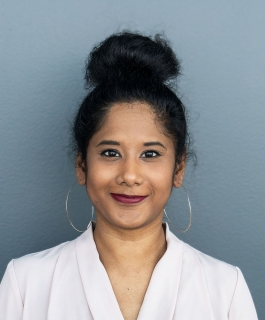 A headshot of Anni Pullagura.
