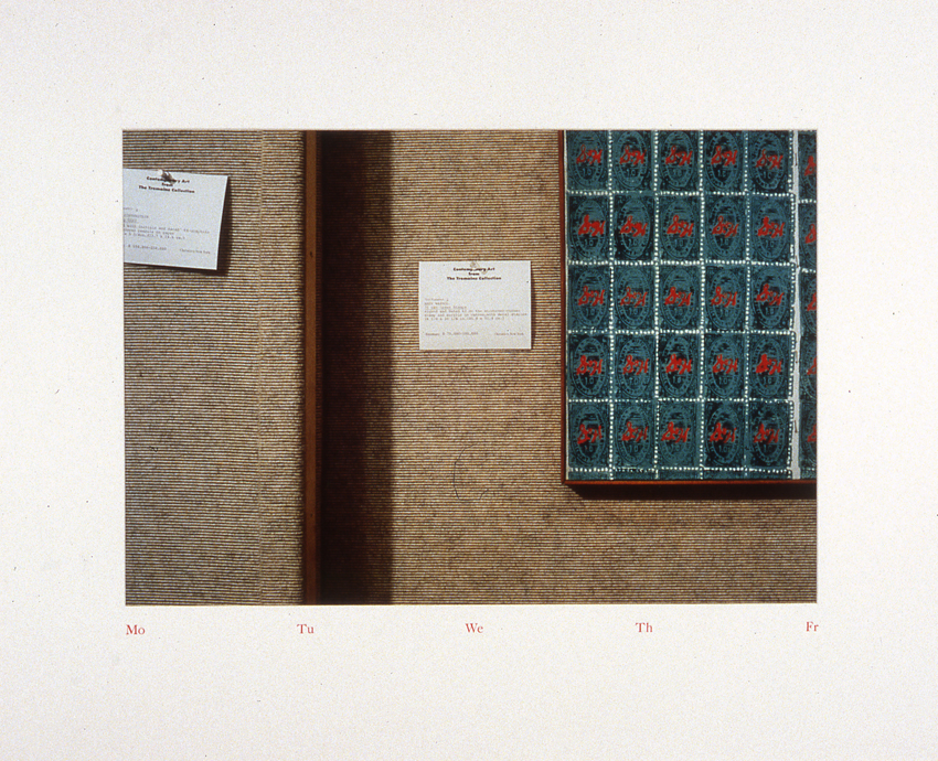 A color photograph depicts two labels tacked to the wall alongside a sheet of Andy Warhol's "70 S & H Green Stamps." The text “Mo Tu We Th Fr” spans the bottom margin.